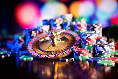 Live dealer spinning the roulette wheel